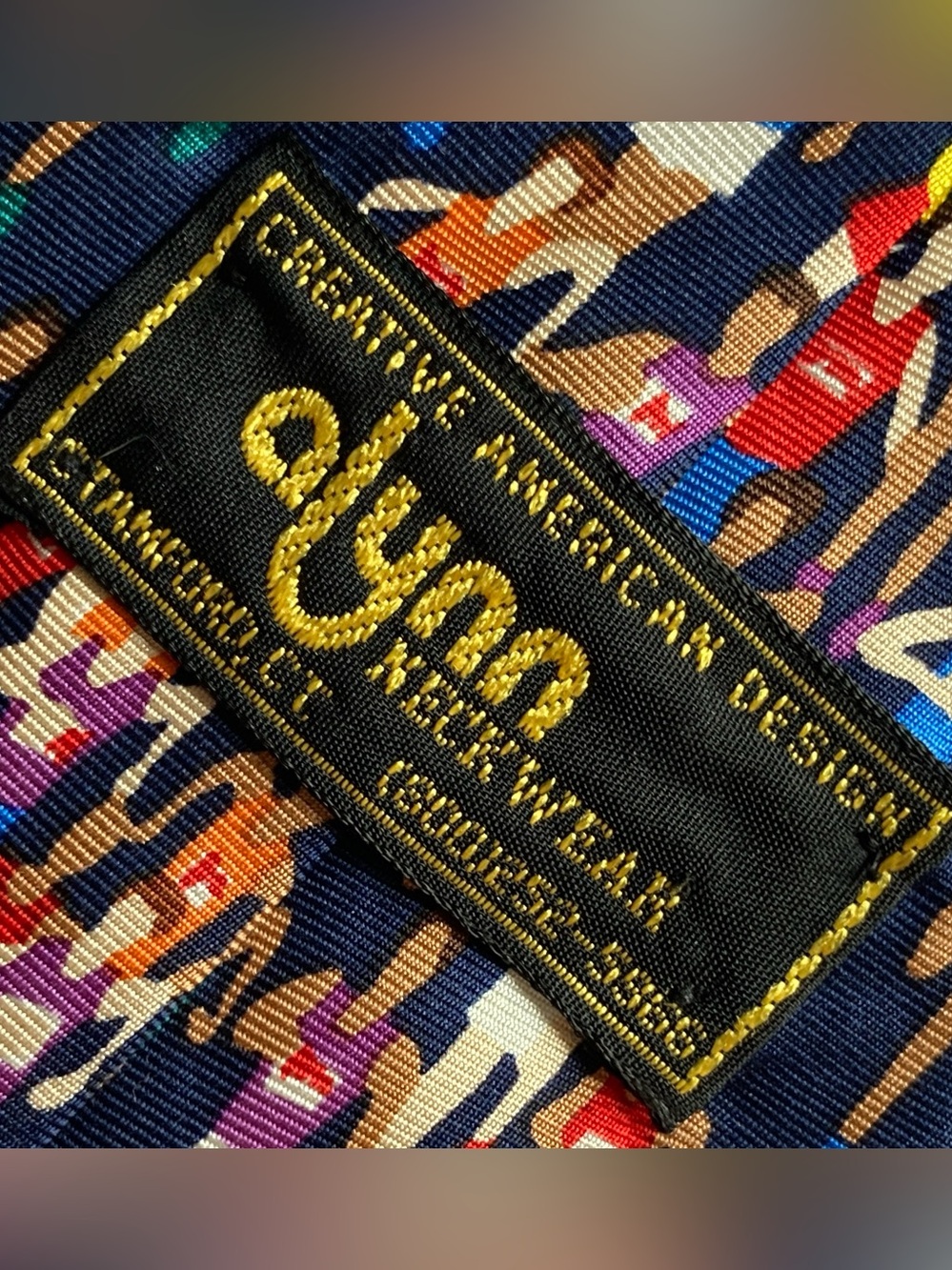 Alynn Neckwear 100% Silk Marathon Print Tie in Navy with Multicolor Figures - Picture 7 of 10
